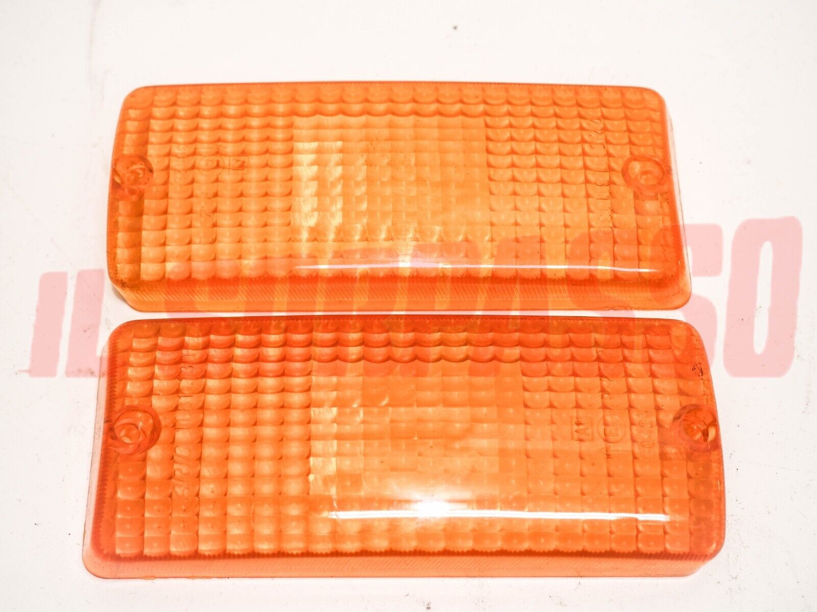 PLASTICHE FANALINI ANTERIORI FRECCE DE TOMASO PANTERA ARANCIO ORIGINALI ARIC